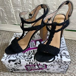 Braided open toed sandals.